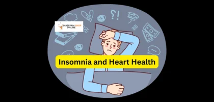 Person suffering from insomnia in bed, highlighting the connection between insomnia and heart health.